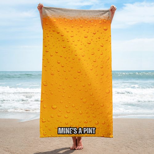 A funny beach towel for men designed to look like a giant pint of lager, a top pick for cool beach towels for adults.