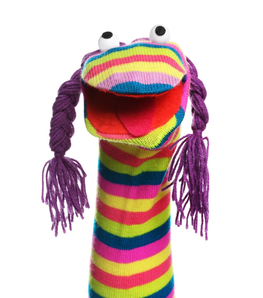 Funny sock puppet with braids isolated on white