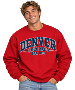 Smiling Man in Denver Varsity Sweatshirt
